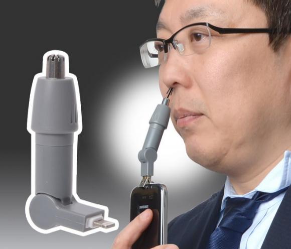 Telefoanele mobile devin din ce în ce mai utile! Japonia a creat un dispozitiv care tunde părul din nas! Uite cum e posibil