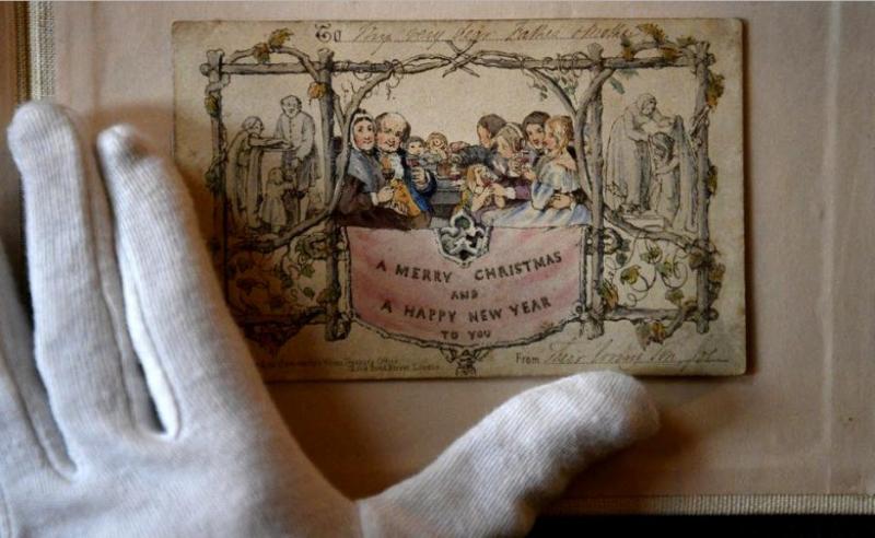 FOTO/ Cum arată prima felicitare de Crăciun din lume. Datează din anul 1843, iar iubitorii sărbătorilor de iarnă o pot admira în Londra