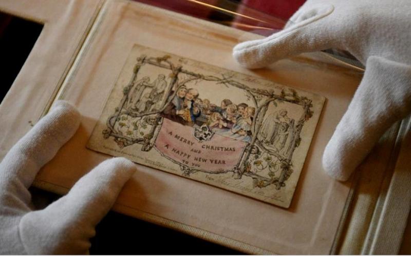 FOTO/ Cum arată prima felicitare de Crăciun din lume. Datează din anul 1843, iar iubitorii sărbătorilor de iarnă o pot admira în Londra