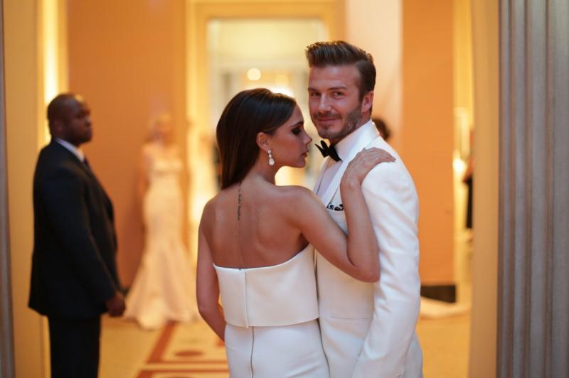David si Victoria Beckham, in timp ce pozeaza sexy spre camera