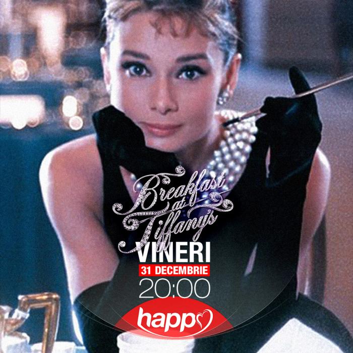 Audrey Hepburn poartă mănuși negre de catifea și diamante