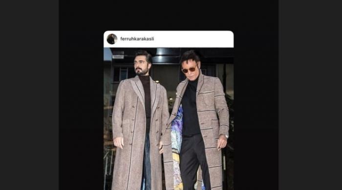 Halil Ibrahim Ceyhan din "Moștenirea" poartă un palton lung, maro