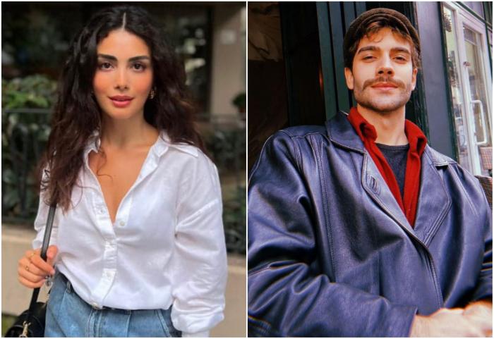 Özge Yağız poartă o bluză albă cu mâneci lungi și Burak Berkay Akgül poartă o geacă albastră