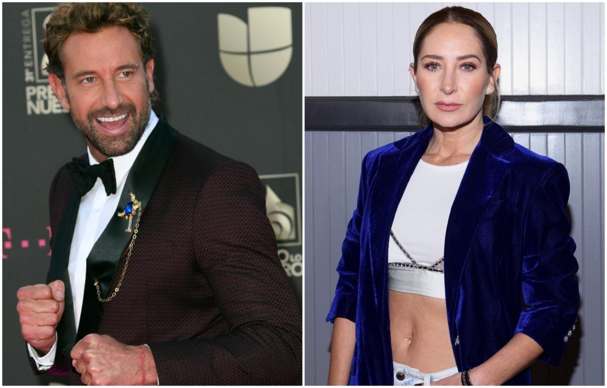 Gabriel Soto poartă o cămașă albă și un sacou închis la culoare, iar Geraldine Bazan poartă un top alb și un sacou albastru