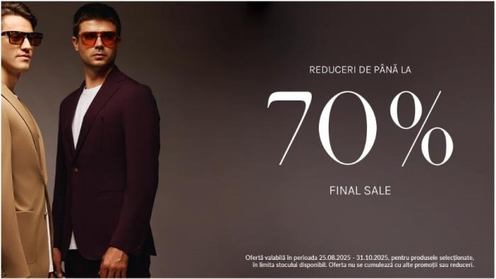 doi bărbați care poartă costume și ochelari de soare pe un fundal închis la culoare